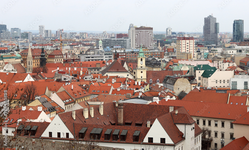 View of the Old Town from the Castle Hill, Bratislava, Slovakia. Street view, old red roofed houses. Spring in Europe. 