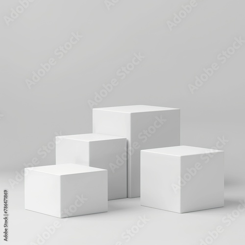 Four white cubes on a white background