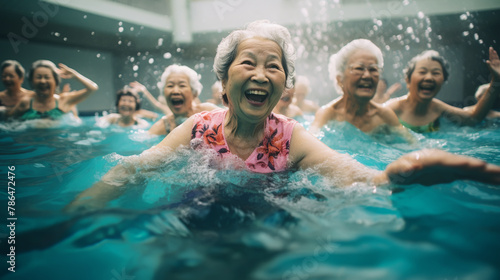 Happy healthy senior woman enjoying active lifestyle swimming in the pool