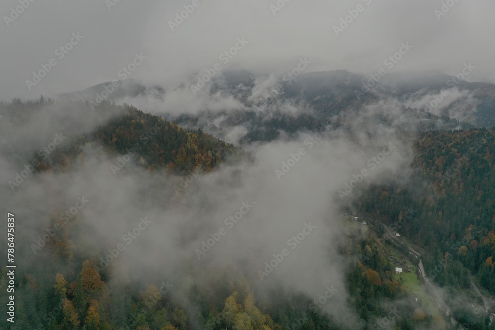 Aerial view of mountains covered with fog