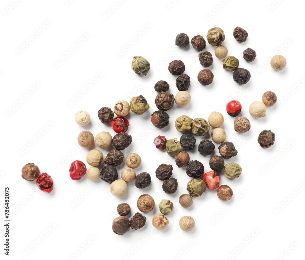 Aromatic spices. Pile of different peppers isolated on white, top view Aromatic spices. Pile of different peppers isolated on white, top view