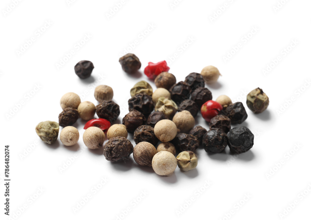 Aromatic spices. Pile of different peppers isolated on white Aromatic spices. Pile of different peppers isolated on white
