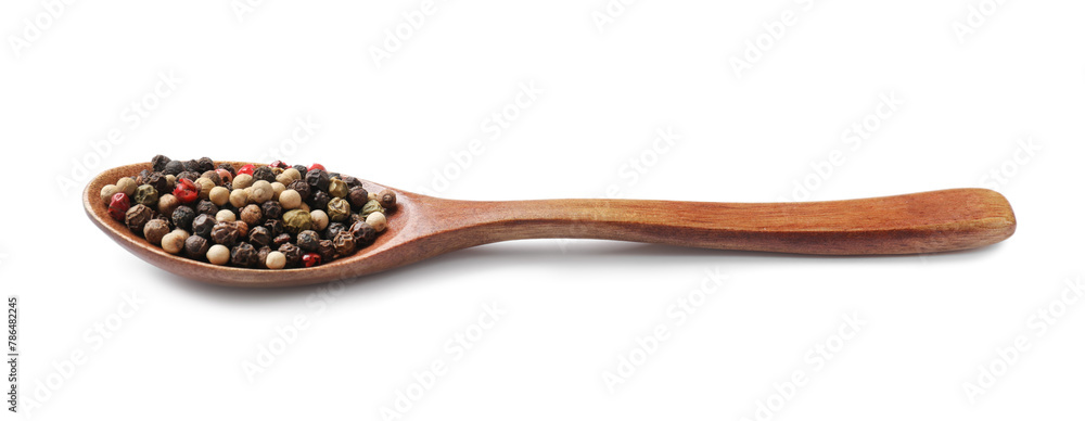 Aromatic spices. Different peppers in wooden spoon isolated on white Aromatic spices. Different peppers in wooden spoon isolated on white