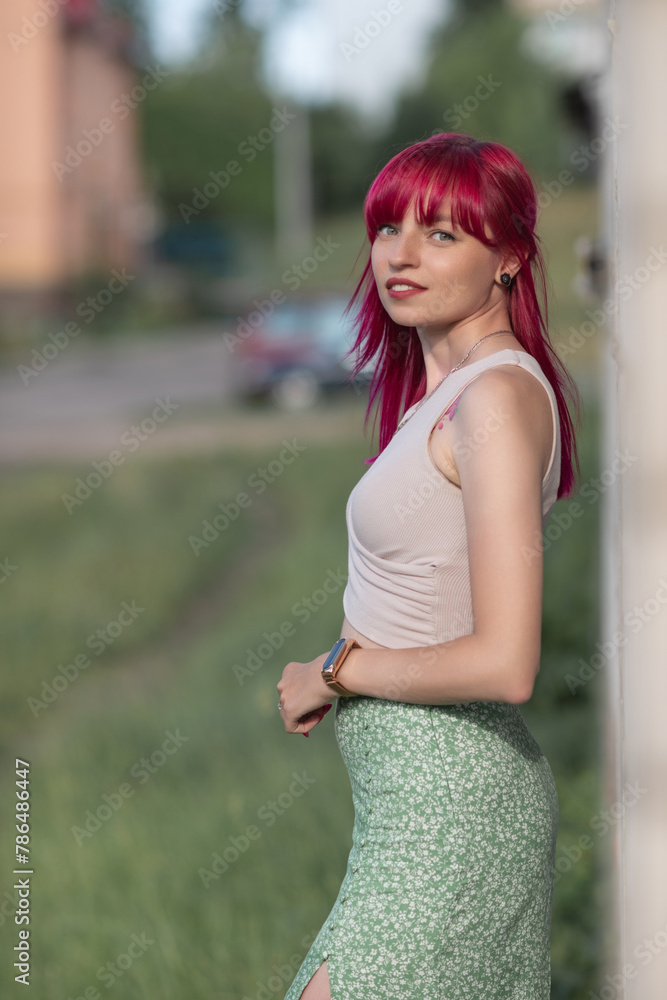 Portrait of a young beautiful red-haired girl outdoors. Portrait of a young beautiful red-haired girl outdoors.