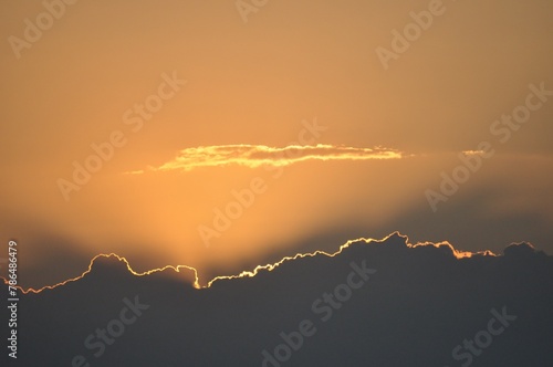 Sunset sky with clouds. Nature background. Sunset sky with clouds and sun