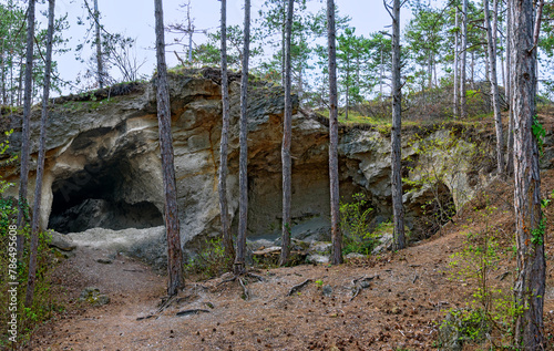 entrance to the cave system "Wild oven" resulting through the former mining of grinding sand from the dolomite rock (Gainfarner Brekzie) at the mountain Harzberg in Bath Voeslau, Austria