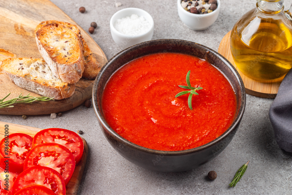 Tomato soup or sauce with rosemary. Healthy, vegan and dieting lunch and dinner concept. Gazpacho. Tomato soup or sauce with rosemary. Healthy, vegan and dieting lunch and dinner concept. Gazpacho.