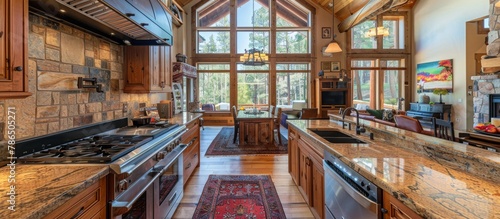 Gourmet kitchen equipped with top-of-the-line appliances and granite countertops elevates cabin living. 