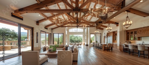 Vaulted ceilings with exposed wooden beams create a sense of spaciousness and grandeur. 