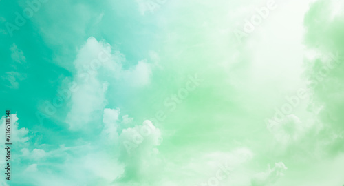 Fototapeta Naklejka Na Ścianę i Meble -  Green Sky Cloud Background Color Teal Abstract Sunset Landscape Pastel weather Light Warm Morning Wallpaper Freedom Summer Winter, Mockup Cosmetic Environment, Heaven Dramatic Sunlight Dusk Beautiful