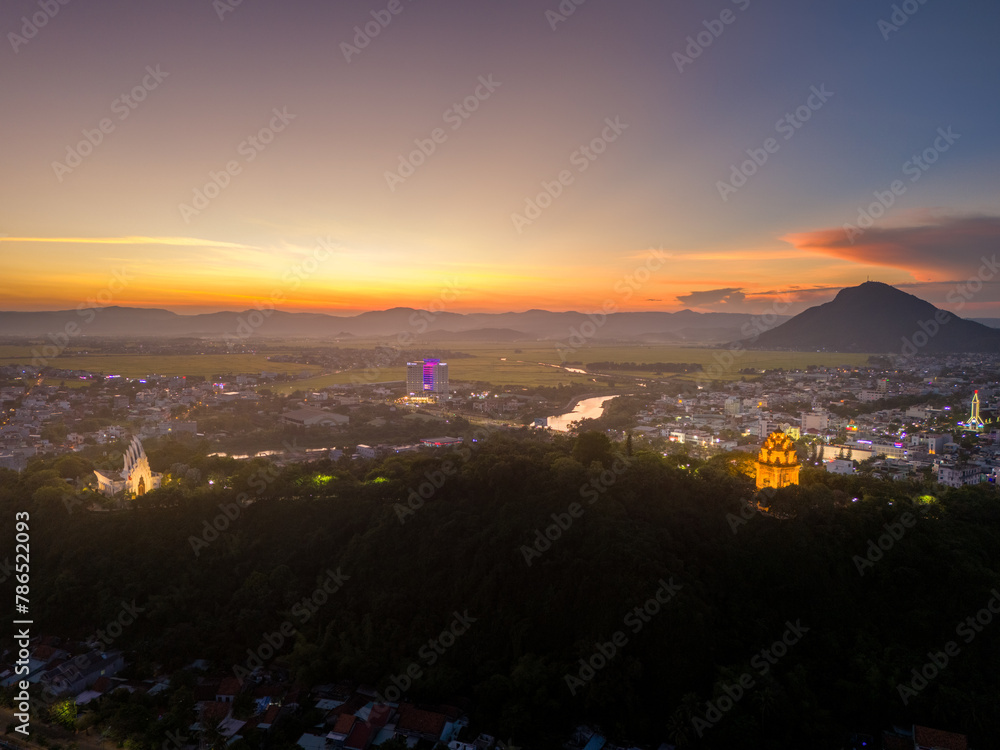 Aerial view of Nhan temple, tower is an artistic architectural work of Champa people in Tuy Hoa city, Phu Yen province, Vietnam. Sunset view