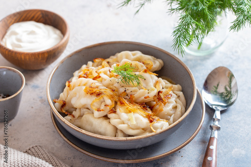 dumplings with potatoes and fried onions, Russian food