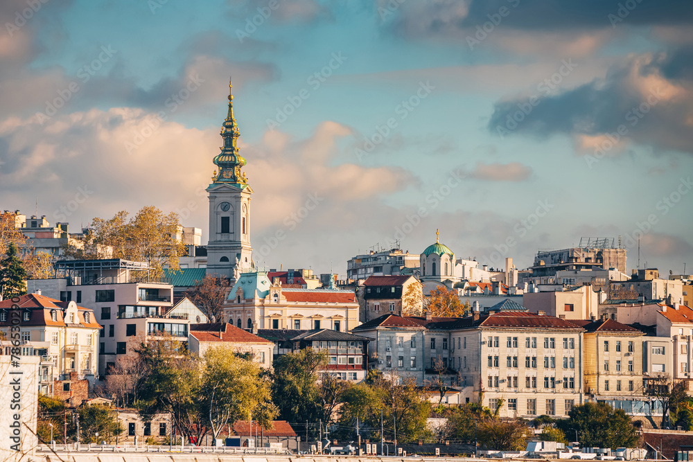 Iconic churches and urban architecture define Belgrade's skyline, creating a picturesque scene along the riverbanks.