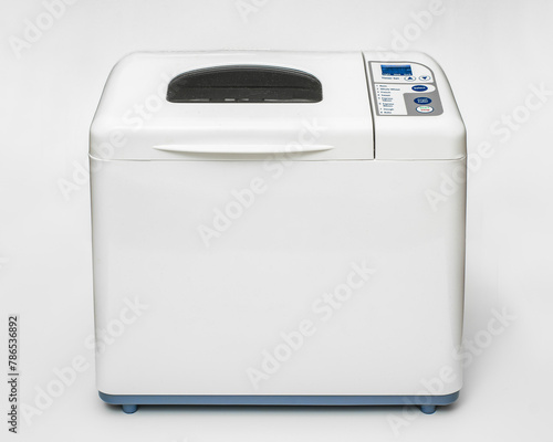 Foto Bread maker machine on neutral background