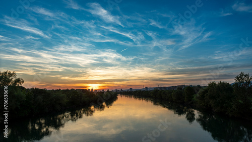 sunset over the river © damianbn