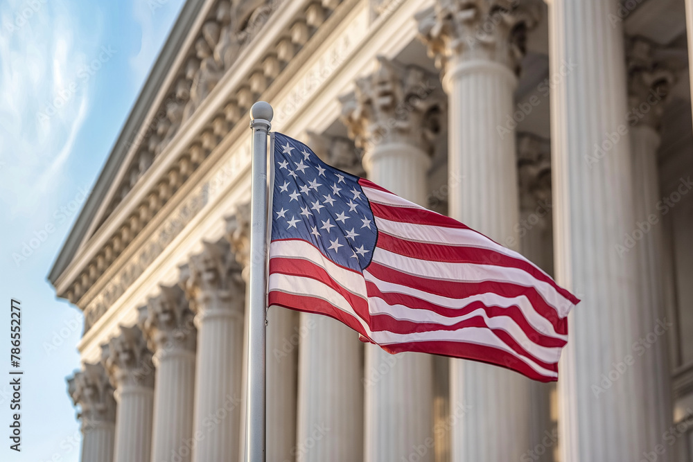 An American flag flying in front of a grand courthouse, representing justice, law, and the American way, patriotic, with copy space