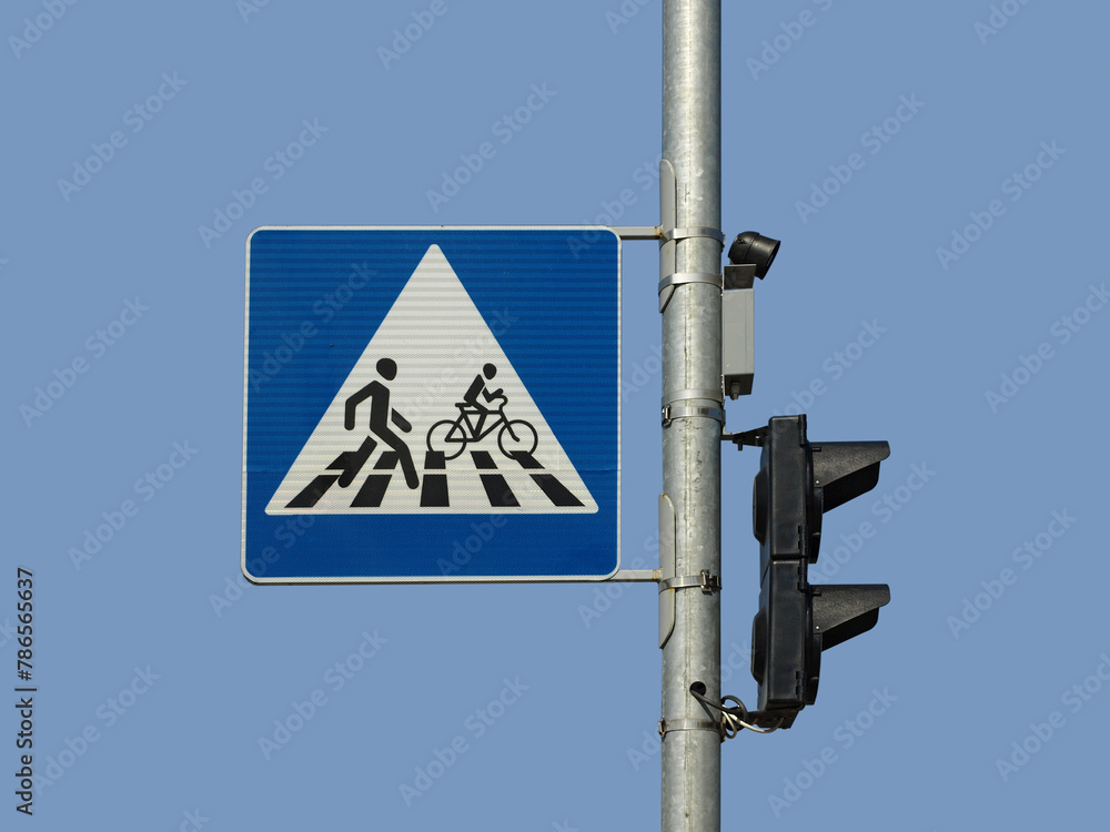 Pedestrian crossing sign against the sky Pedestrian crossing sign against the sky