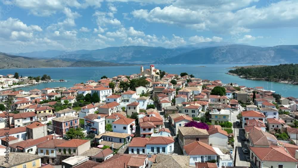 Aerial drone overview video of picturesque fishing village of Galaxidi and landmark church of Agios Nikolaos, Fokida prefecture, Greece Aerial drone overview video of picturesque fishing village of Galaxidi and landmark church of Agios Nikolaos, Fokida prefecture, Greece