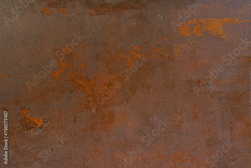Old, rusty, brown surface of an iron sheet.