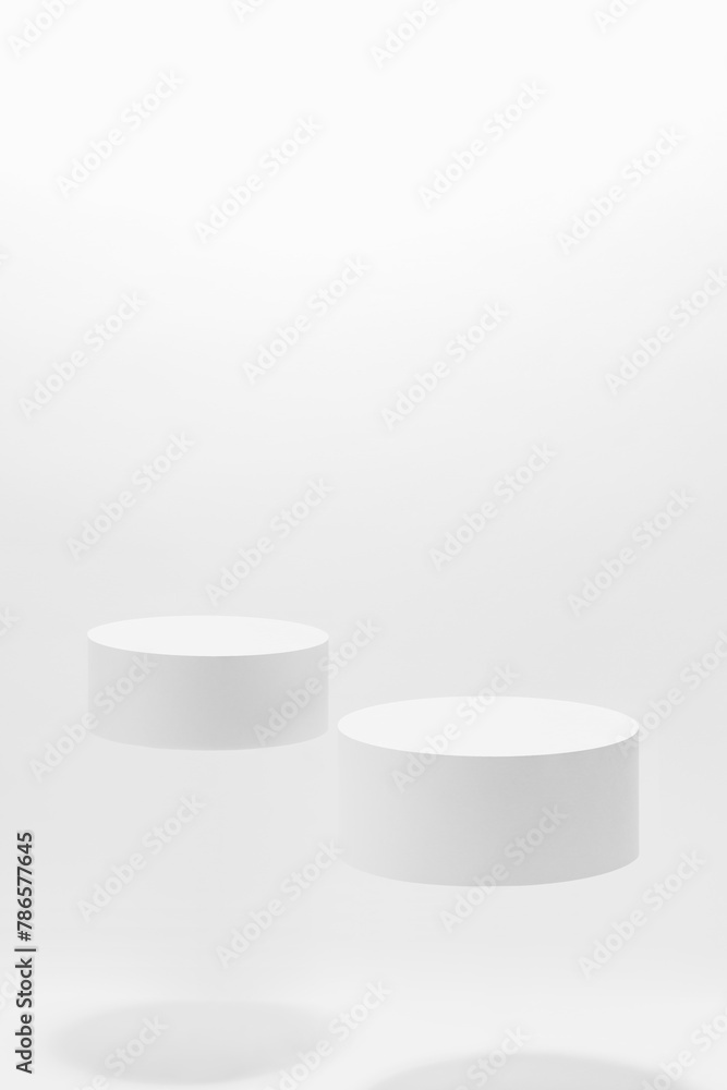 Abstract white scene mockup - two round white cylinder podiums, soar in hard light, shadow. Template for presentation cosmetic products, goods, advertising, design, display, showing in spring style. Abstract white scene mockup - two round white cylinder podiums, soar in hard light, shadow. Template for presentation cosmetic products, goods, advertising, design, display, showing in spring style.