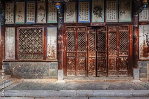 Richly decorated facade at the courtyard of a historic house in the ancient town of Tuanshan, Yunnan province China
