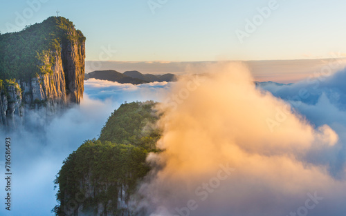 Sea of clouds at sunrise in the limestone karst mountains of Enshi Grand Canyon National Park, Hubei province China