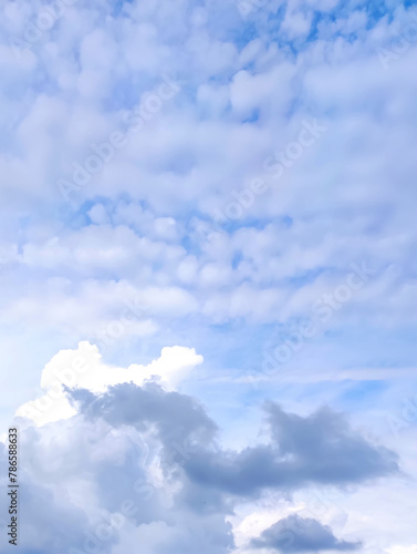 Sky with white clouds. Cloudy weather in summer day.