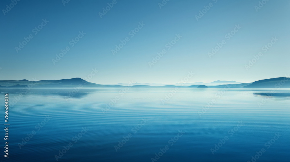 A tranquil scene featuring a nearby water surface and distant mountains, all bathed in a soothing blue hue, evoking a sense of sophistication and serenity A tranquil scene featuring a nearby water surface and distant mountains, all bathed in a soothing blue hue, evoking a sense of sophistication and serenity