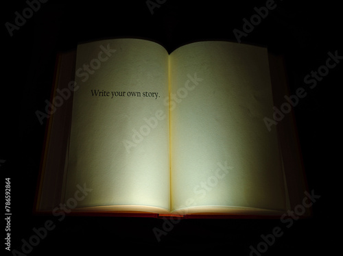 Open book with Write Your Own Story text
