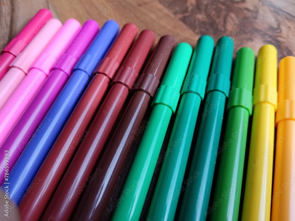 Marker colour on wooden table. Marker colour on wooden table.
