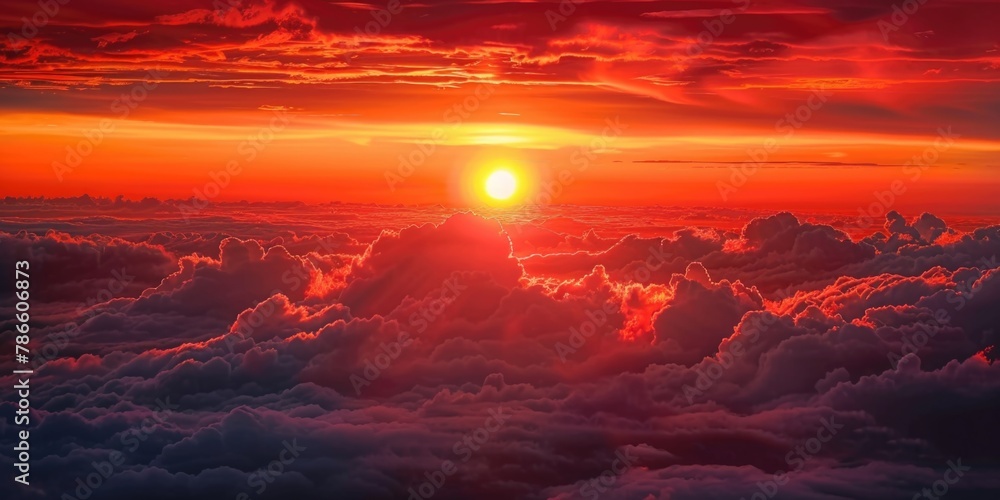 Beautiful sunset over fluffy clouds, perfect for nature backgrounds or inspirational designs