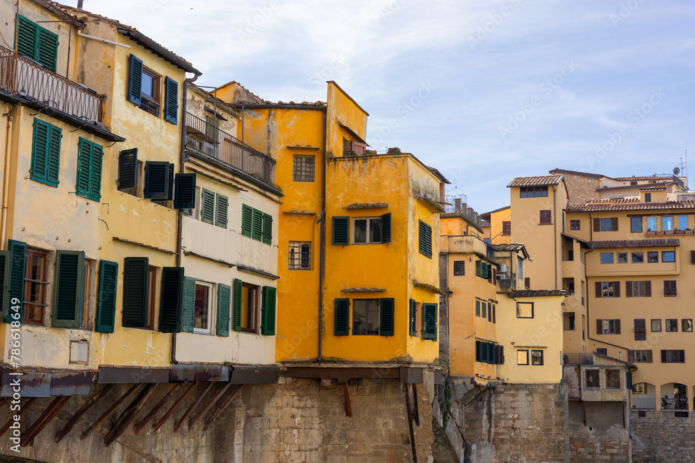 Ponte Vecchio over Arno river in Florence, Italy. Visiting Italian landmarks. Concept of travel, tourism and vacation
