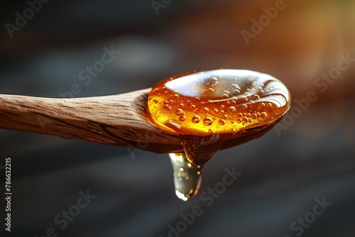 Honey on wooden spoon