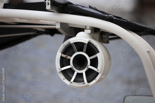 Hanging audio speaker on a motorboat