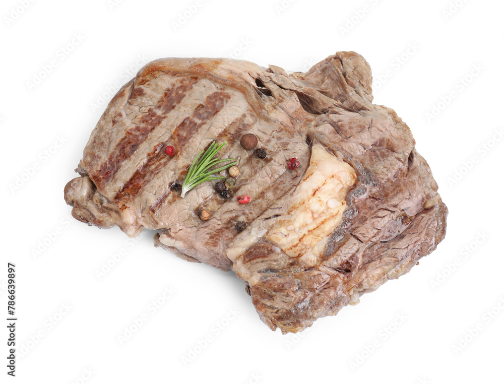 Fototapeta premium Piece of delicious grilled beef meat, rosemary and peppercorns isolated on white, above view