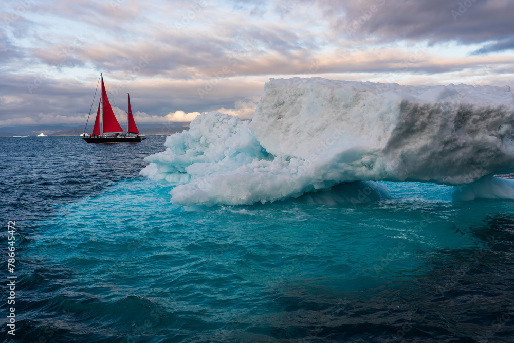 Iceberg with Red sailboat in Ilulissat Greenland - obrazy, fototapety, plakaty 