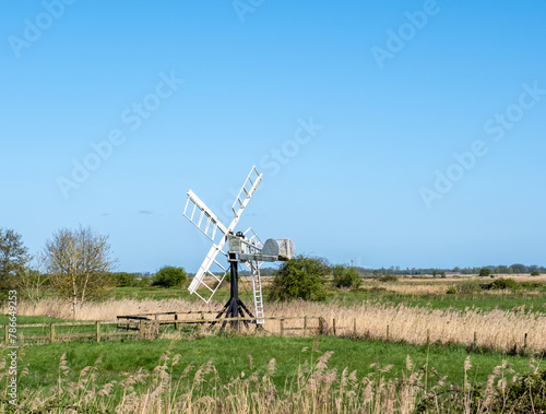 Tablou pe pânză Old, historic and defunct  drainage Mill in Upton marshes in the heart of the No