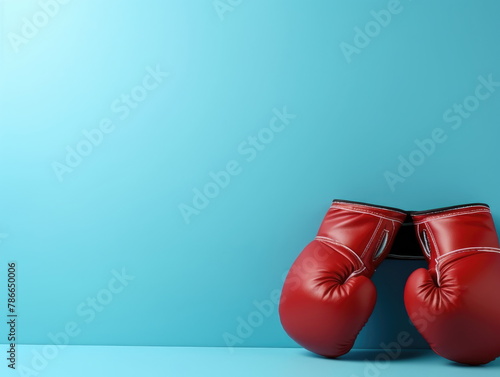 Boxing gloves on a gradient color background. Copy space © almal