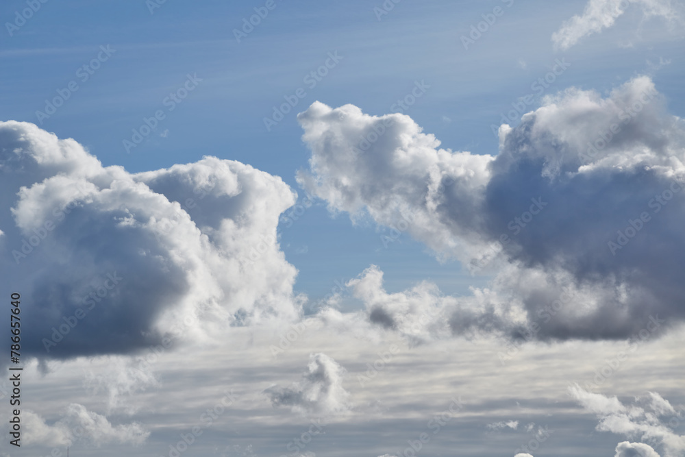 Fototapeta premium Cumulus clouds cover the sky