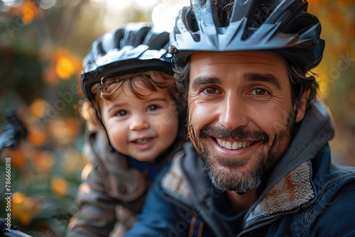 Learning, bicycle and proud dad teaching his young son to ride while wearing a helmet for safety in their family home garden. Active father helping and supporting his child while cycling outside