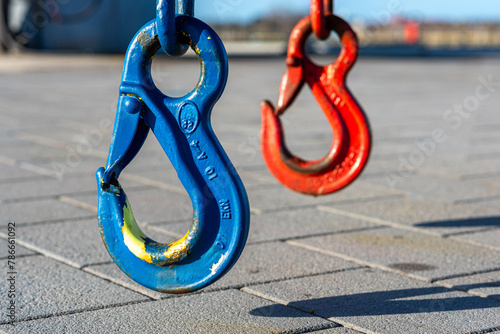 Hook for lifting boats into the harbour basin of the Burgtiefe marina on the island of Fehmarn. A lifting hook is a device for grabbing and lifting loads by means of a device such as a hoist or crane