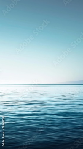 Tranquil ocean surface with gradient blue hues.