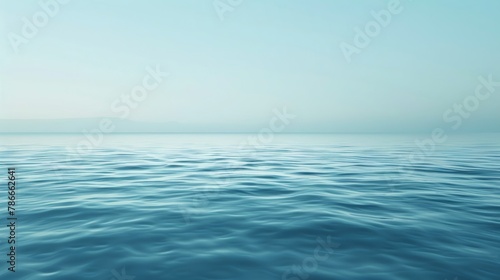 Serene ocean landscape with horizon and clear sky.
