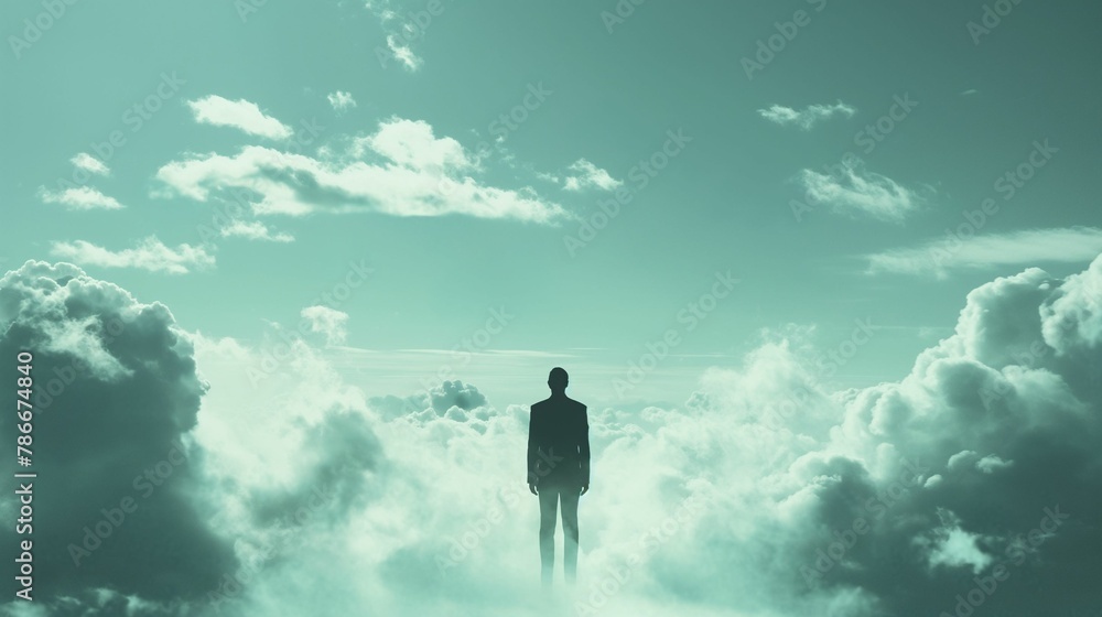 A solitary silhouette stands elevated amongst the clouds, creating a serene and contemplative mood against a sky backdrop. A solitary silhouette stands elevated amongst the clouds, creating a serene and contemplative mood against a sky backdrop.