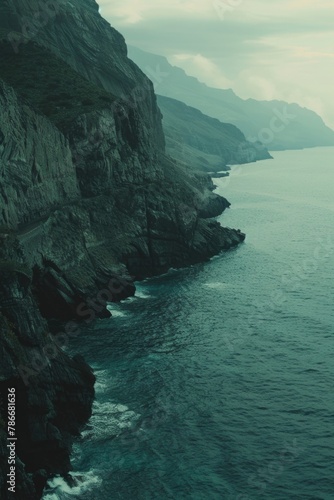 A scenic image of a large body of water next to a cliff. Perfect for travel websites or nature-themed designs