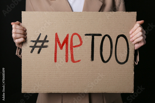 Woman holding cardboard pap...