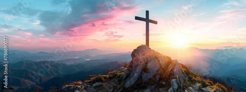 A cross on top of the mountain at sunset. Easter. Crucifixion of Jesus Christ