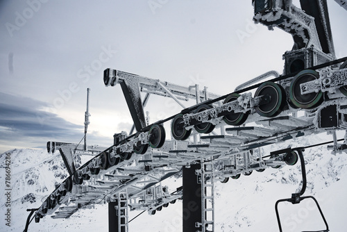 frozen chairlifts in the mountains © Kacper