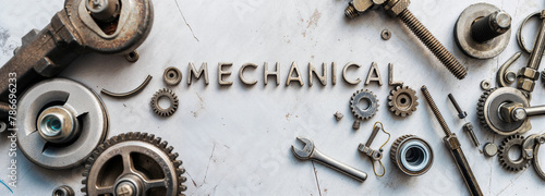 metal background of mechanical tools and pipes of cogs and wheels and wrench bolts for engineering MEP plumbing fixing and repair services as wide banner with copy space photo