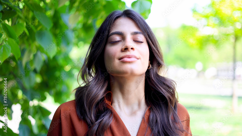 Portrait of a beautiful Latin American woman enjoying in the park Portrait of a beautiful Latin American woman enjoying in the park